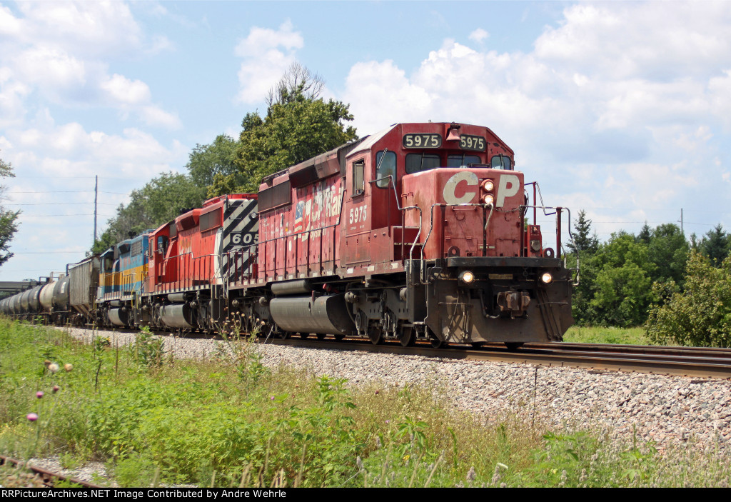 CP 5975 leads a nice classic EMD lashup on ethanol train 642